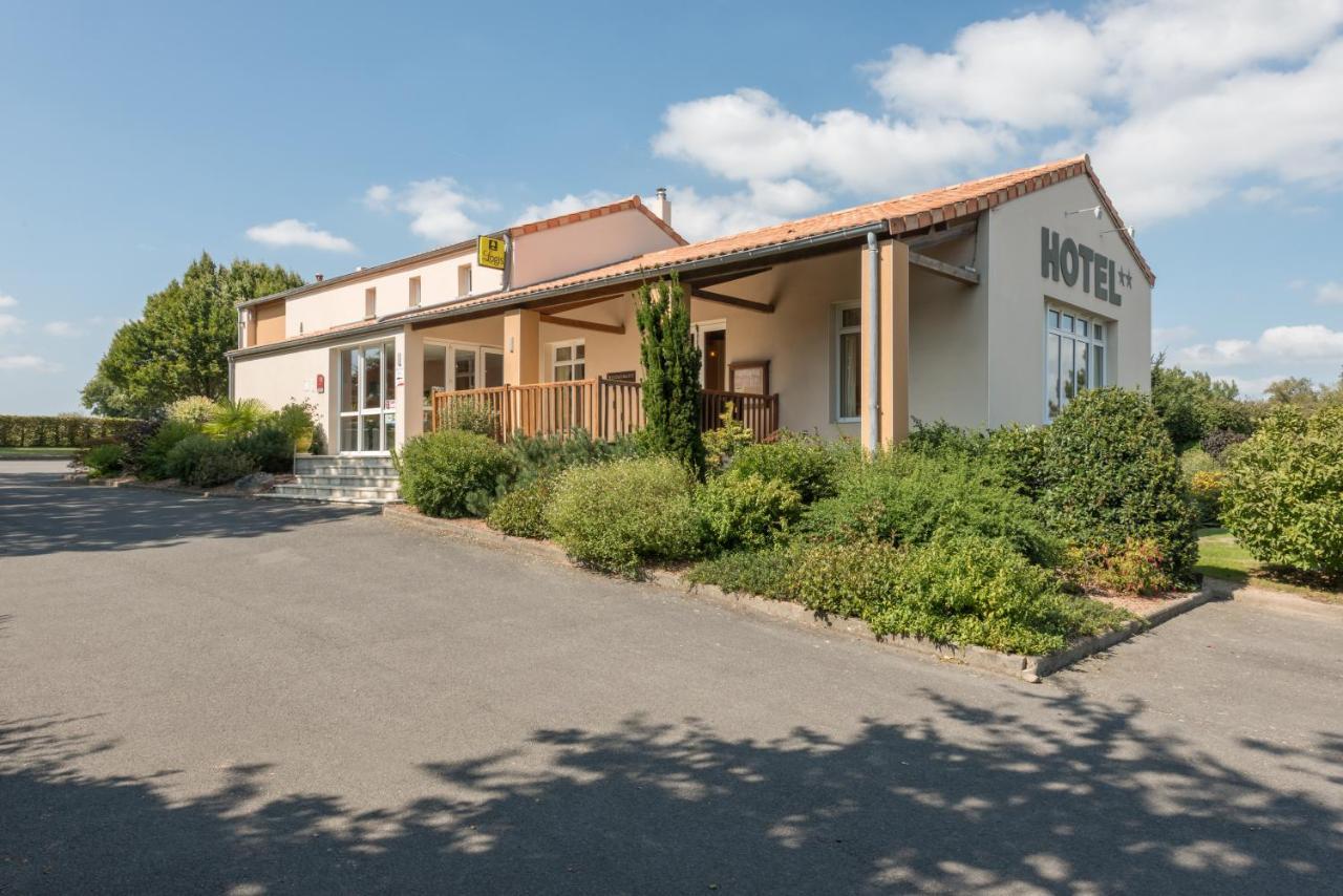 Logis Hotel Les 3 Marchands Бресюир Экстерьер фото